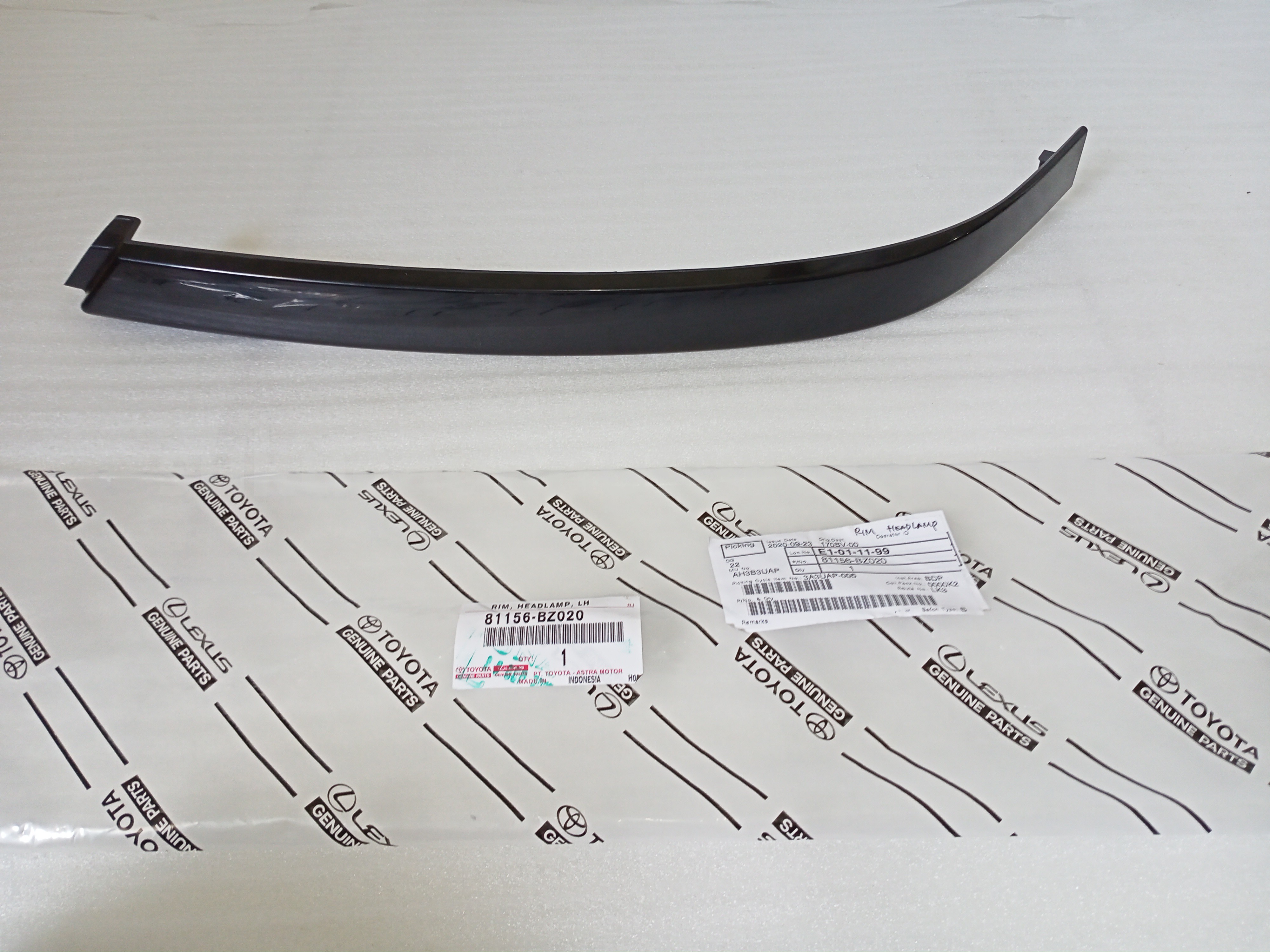 81156BZ020 RIM, HEADLAMP, LH - TOYOTA