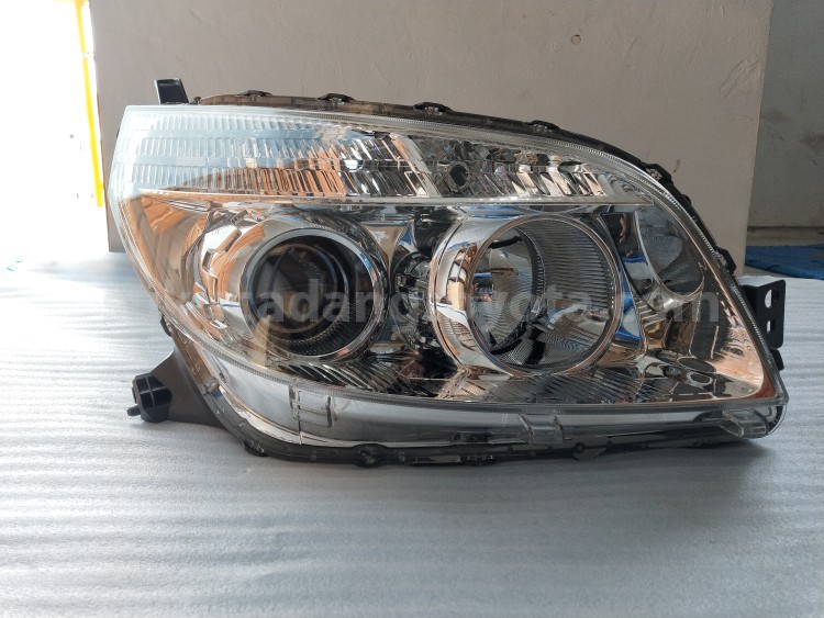 81130BZ200 HOUSING AS H/LAMP RH - TOYOTA