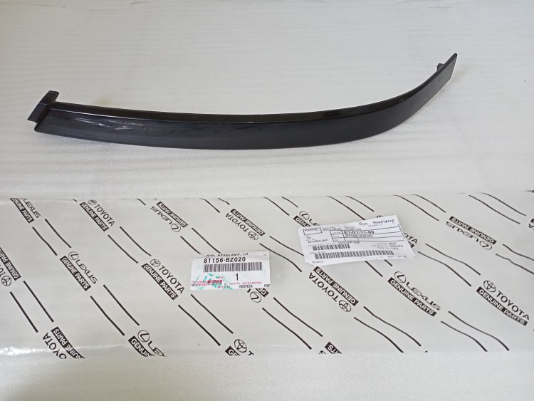 81156BZ020 RIM, HEADLAMP, LH - TOYOTA