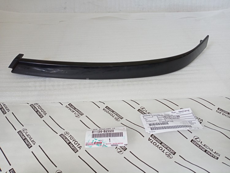 81156BZ020 RIM, HEADLAMP, LH - TOYOTA